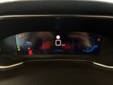 a close up of the dashboard of a car with a digital display