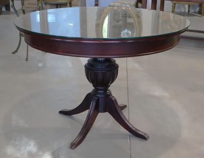 Guéridon en bois de placage. Travail anglais du XXe siècle. …