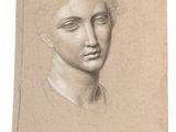 an old drawing of a woman ' s face on a piece of paper