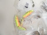 many different types of fishing lures in the bag