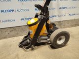 a small machine that is sitting on the ground