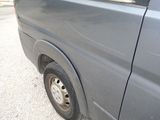 an image of a van parked on the side of the road