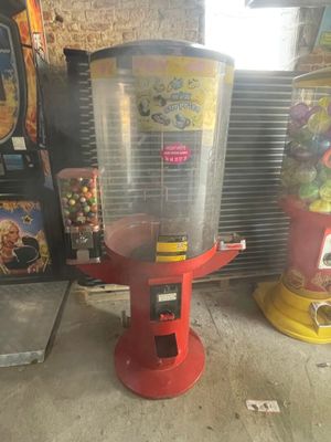 a machine that is sitting on the floor next to other machines