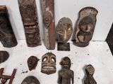 many different types of wooden carvings on the table