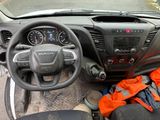 a car dashboard with a bunch of items on it