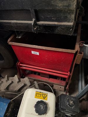 a picture of a red truck with a white tank and a red box