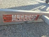 a close up of a metal pole with a sticker on it