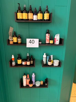 several shelves with different types of skin care products on them