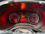 a close up of a car dashboard with various gauges