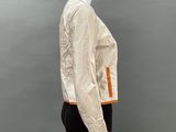 an image of a mannequin wearing a white shirt and black pants