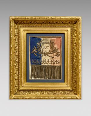 a gold frame with a picture of a dragon and a banner
