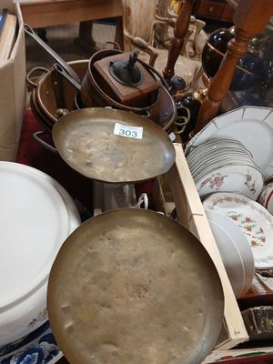 a lot of dishes and pans that are on the table