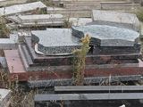 a lot of old tombstones in a cemetery