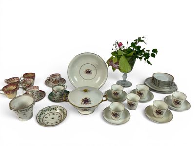 many different types of dishes and cups on the table