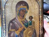 painting of a woman holding a child in her arms