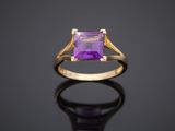 an amethorate and gold ring with a square cut amethorate