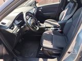 the interior of a car with a steering wheel and a dash board