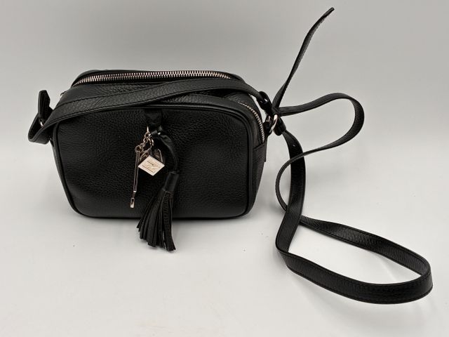 LANCEL : sac à bandoulière en cuir grainé, 2 poches zippées. Eta ...