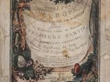 an old book with a picture of a bird on it