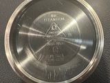 an image of a close up of a metal object on a table