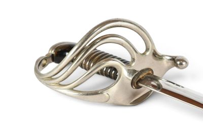 a close up of a metal object on a white background
