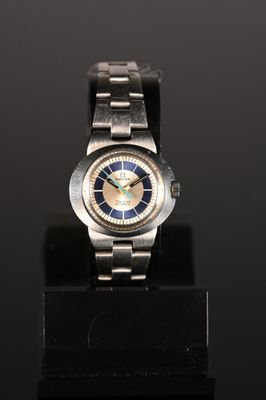 an image of a wrist watch on a black surface