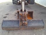 a close up of a tractor on a concrete surface