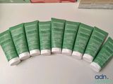 six tubes of phytother sit on a table next to a box of phytother