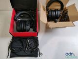 a box of headphones and a pair of headphones