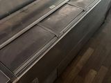 a conveyor belt in the middle of a kitchen