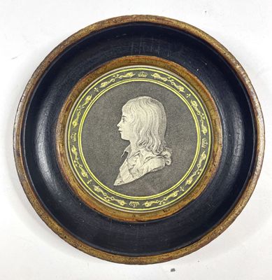 a picture of a picture of a woman in a black and gold frame