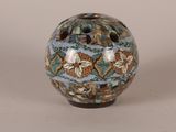 a small vase that is sitting on a table