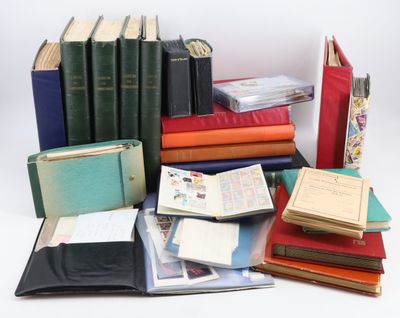 a lot of books that are stacked on top of each other