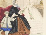 an old book with a picture of a woman and a child
