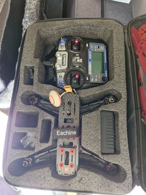 a case that has a remote control and other items in it
