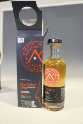 an image of a bottle of whisky next to a bottle of wine