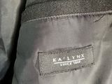 a close up of the label on the back of a jacket