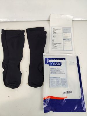 a pair of black socks and a pair of white socks