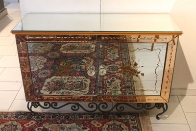 Commode miroir et fer forgé 83 x 122 x 44 cm ( un côté cassé…