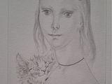 portrait d'une jeune fille avec un chat sur les genoux