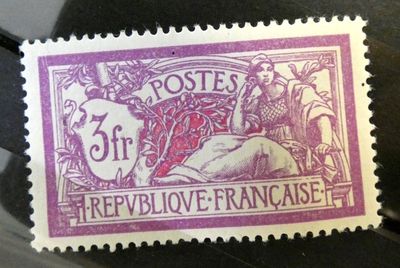 a close up of a stamp with a picture of a woman on it