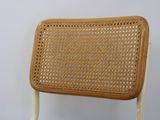 an image of a wicker chair on a white background