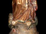an image of a statue of a woman holding a child