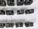 many pieces of metal that are on a table