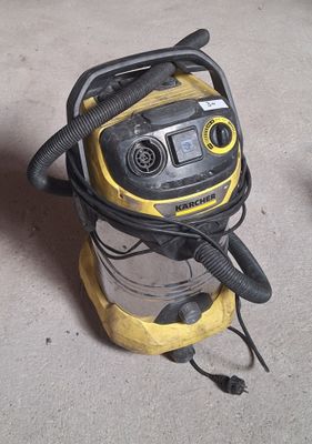 a vacuum that is sitting on the floor