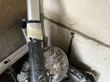 an image of a dirty stove in a dirty room