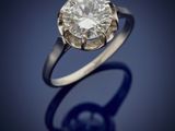 a diamond single - stone ring, by van cleef