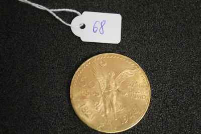 a gold coin on a black surface with a price tag