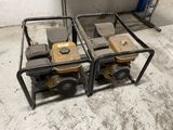 two small generators that are sitting on the floor