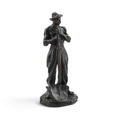 an image of a statue of a man with a hat and a cane